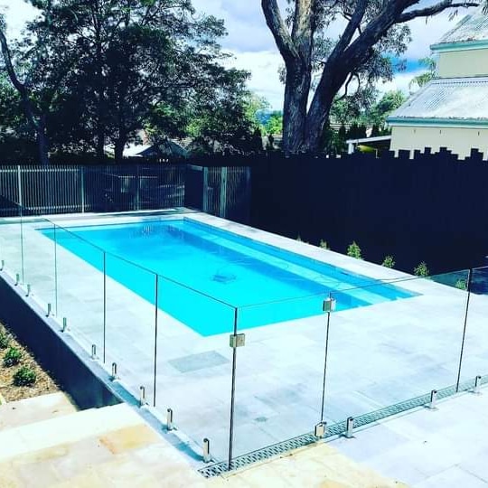 Villa exterior featuring high-quality Glass Aluminum Work on windows and doors.