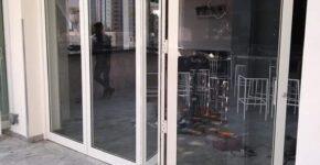 Glass Aluminum Dubai team installing sliding glass doors in a luxury villa.