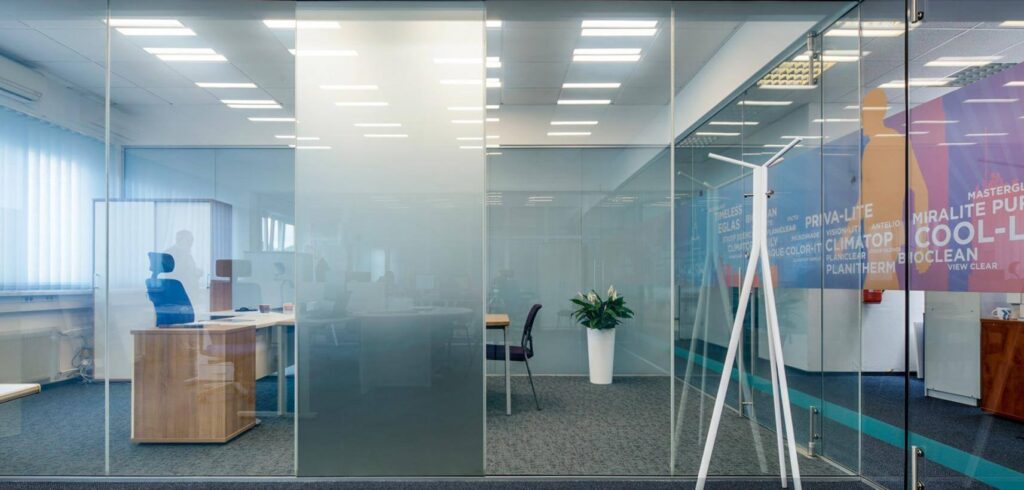 Frosted office glass partition in Dubai providing privacy in a corporate space